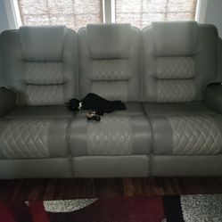 Brand New Reclining Sofa And Loveseat 