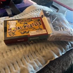 Nib IQ brain Teasers Metal Puzzles  Both For 10$. 