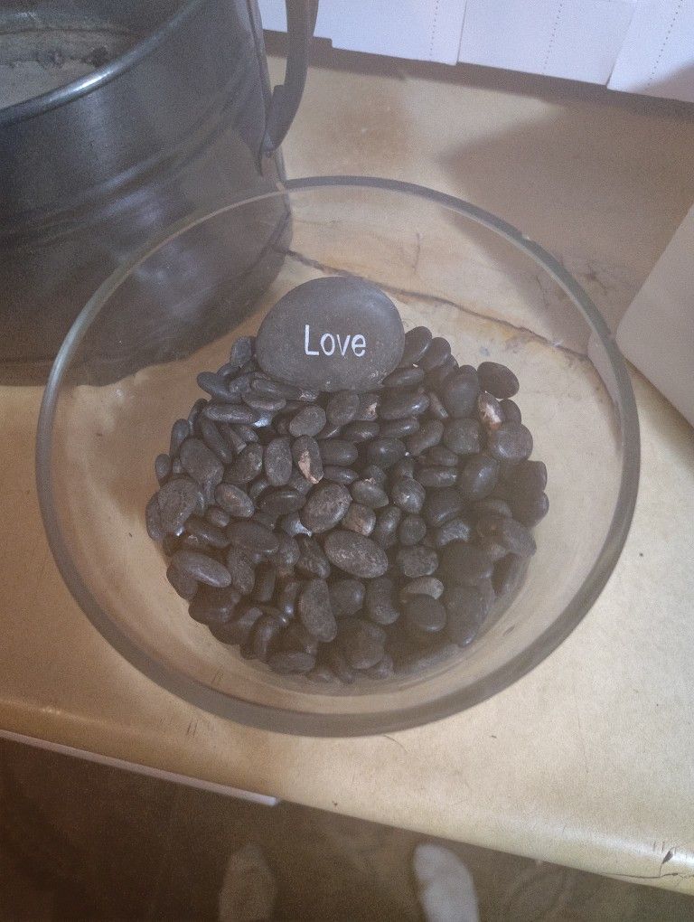 Selling A Brand Knew Glass Jar With Black Rocks And Pink Red Sand In It Under The Rocks Selling or 30 I Pair 50 For It
