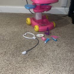 Barbie Pet Care Cart. Microscope has a piece broken off. Couple of plastic bottles are dented & 1 is missing label. Syringe is missing a piece. Decals