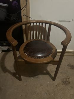 beautiful wood and leather chair