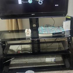 3 Tier Black TV stand for sale 48 Inch tv comes  free.  Free....its not a smart tv but all you need is a firestick 