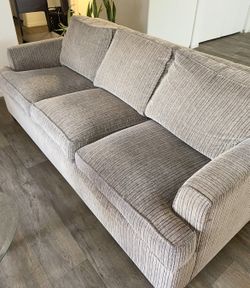 Color is beige  comes with a bed