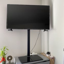flat screen tv and tv stand
