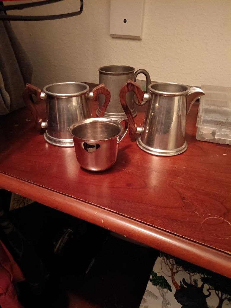 Real Silver tea cups and pewters