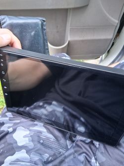 Universal car stereo system with back up camera capabilitie