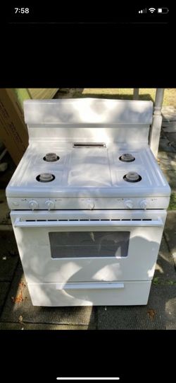 Gas stove in good, working condition.