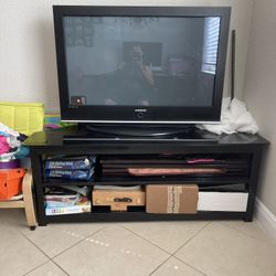 40 inch Samsung TV and TV cabinet