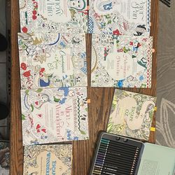 Seven Coloring Books With Coloring Pencils
