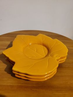 Set of maple leaf candle plates