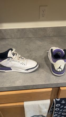 Purple and white Jordan’s 3’s