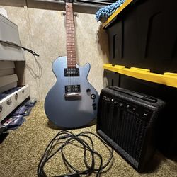 Blue Epiphone Electric Guitar with Amp and Pickup