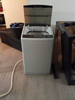 This is a 2in 1washer dryer set great for a quick convenient washing and drying holds up to 25 lb loads spin cycle after washes and drains out then th