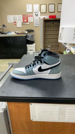 Blue and white Nike
