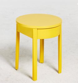 Yellow IKEA STOCKHOLM side table/ nightstand