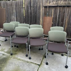  8 Kimball chairs with wheels, can be staked, good condition, $20 each