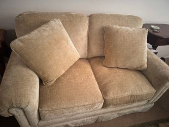 Beige love seats