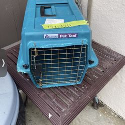Good Condition, Carrier And Beds For A Small Or Medium Size Pet
