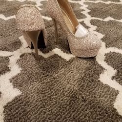 Gold high heels