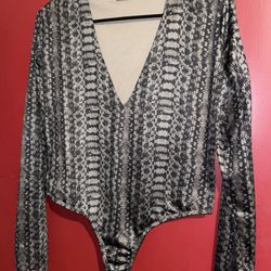 Akira bodysuit size large . $30 retail price