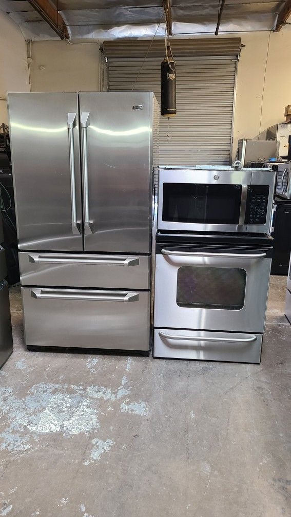 Refrigerator Ge Monogram 4 Door, Stove Electric And Microwave In Stainless Steel Combo Delevery