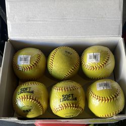 Soft compression softballs