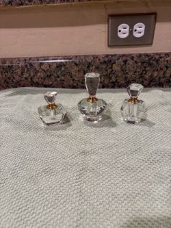 Three Vintage Heavy Clear Glass Perfume Bottles