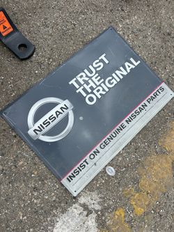 Nissan metal sign