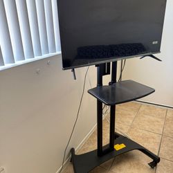 32” Tv Plus Rolling Stand