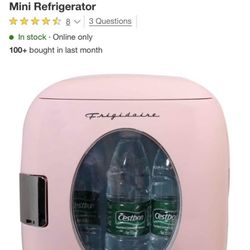 Frigidaire Retro Mini Beverage Refrigerator in pink color.