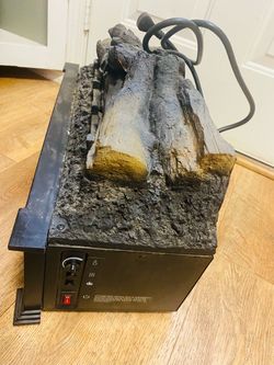 Electric log fire heater with remote control