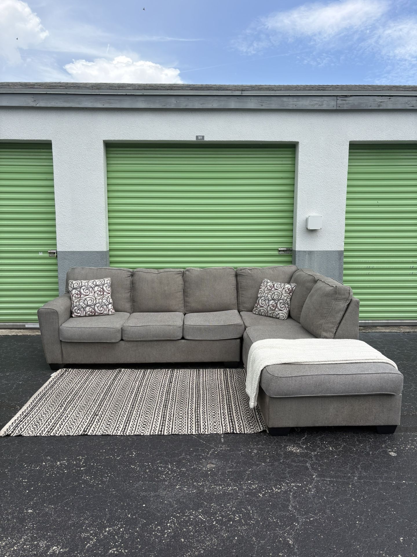 Free Delivery - Grey Sectional With Chase