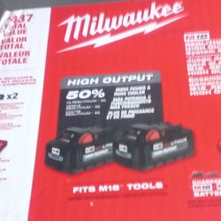 MILWAUKEE KIT 2 NEW BATTERY's & CHARGER NEW  $150.00
