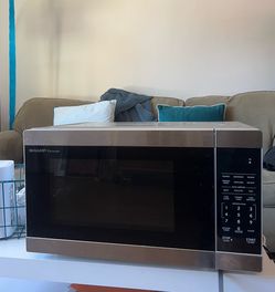 Used Sharp 1000w Microwave 1.1 cu.ft.
