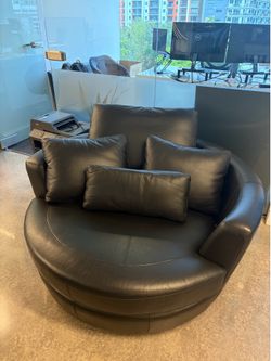 Round swivel leather sofa chair x2
