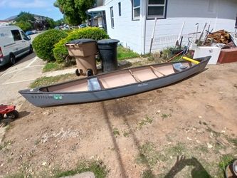 One seventy four discovery old town , eighteen footish canoe