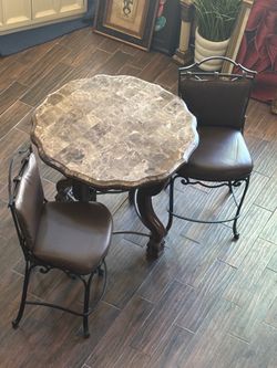 Marble Top Pub table with 2 rod iron chairs