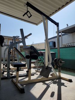 Selling home gym olympic bench press And  a multi-function cable gym machine