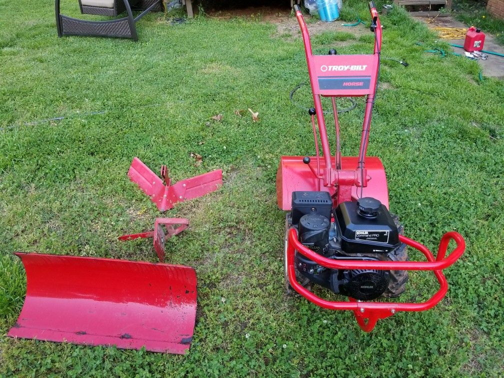 Troy-bilt Horse w/ dozer blade & furrorer