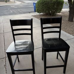 2 solid wood counter-height chairs. Very sturdy