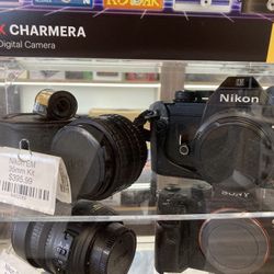 Nikon EM 35mm Film camera W/50mm 1.8 Lens, 2x Teleconverter And 35mm Film Roll