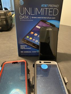 Samsung Express Galaxy Prime 2 with 3 cases