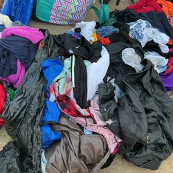 A Lot Of Clothes For Men, Women, Children All Sizes And More Include The Suitcase And More All for $60