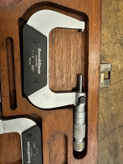 Micrometers And Angle Square 
