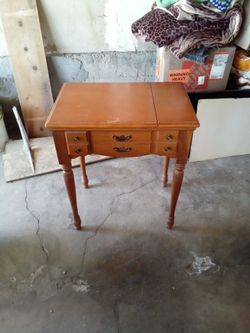 Singer sewing machine cabinet