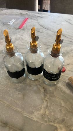 Glass bottles syrup pour coffee