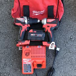 RYOBI COMBO DRILL HAMMER AND IMPACT BRUSHLESS CORDLESS WITH BATTERY XC 4.0 AND CHARGER WITH BACKPACK BRAND NEW 