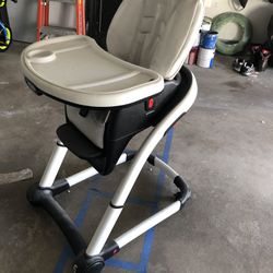 Graco Highchair - Grows With Child, Can Convert To A Booster Seat. 