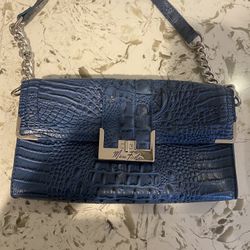 Marc Fisher blue snakeskin hand bag with silver chain, can be worn as a shoulder bag or clutch