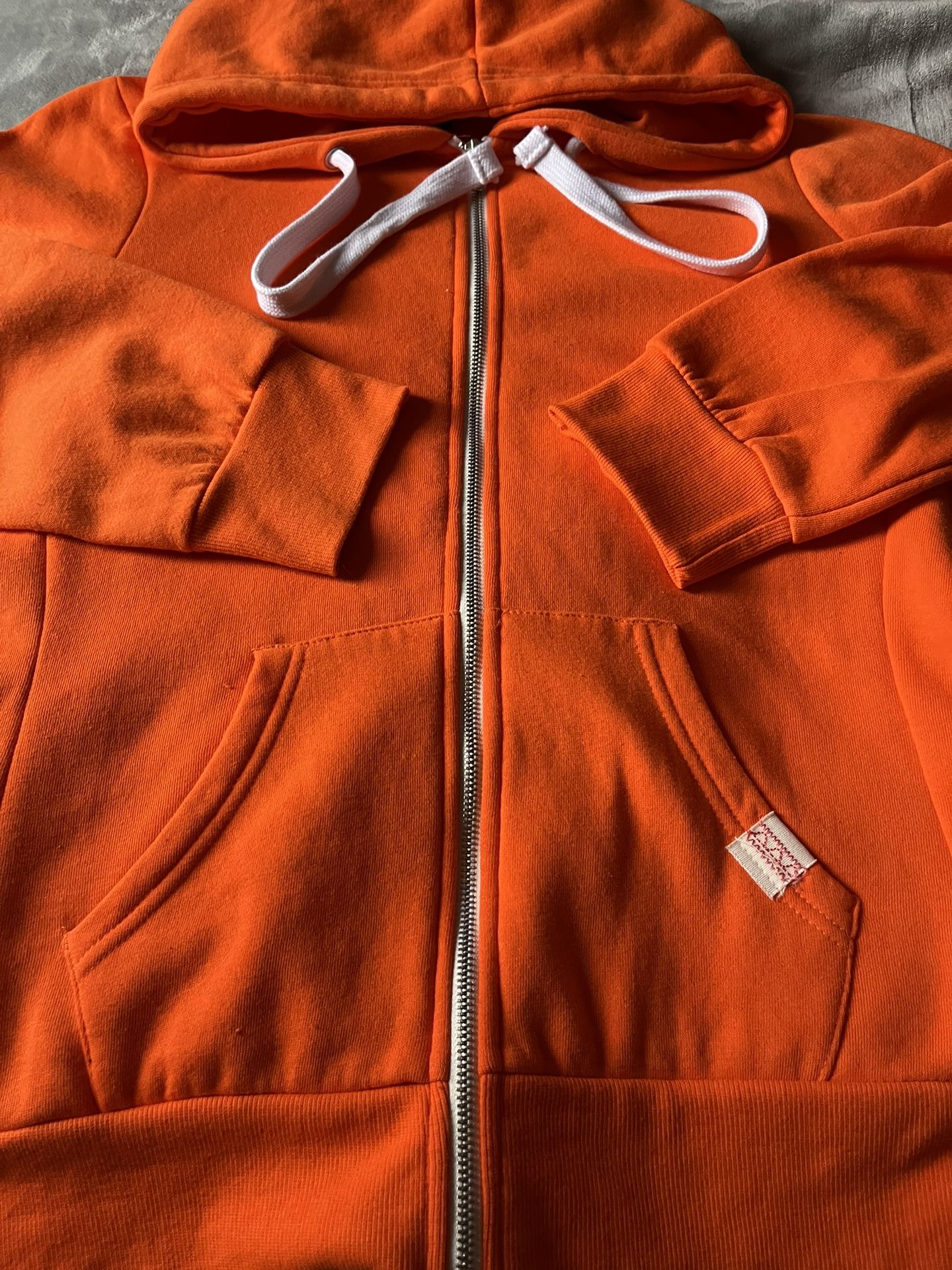 Woman’s Orange  Sweatsuit/XL/20.00 for pick up 